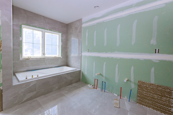 Bathroom renovation Tweed Heads showing bathroom mid renovation, raw walls and bath unfinished